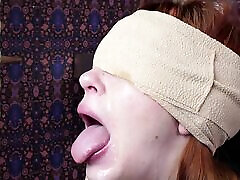 Blindfolded cum addicted redhead slave girl gagging on a cock Blindfolded cum addicted redhead slave girl gagging on a cock