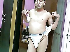 Sexy Sissy crossdresser femboy in white bra-pantie.