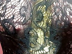 werewolf woman through fishnets dress