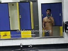 iacovos pov grinding cock deep in public gym locker room in Athens, Greece, showing off big hairy Greek cock