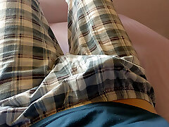 Twink cute two lun wala throbbing dick under his plaid trousers pajama