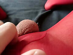 Nylon boy has fun in red pantyhose