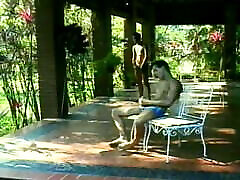 Two gay dudes get horny and fuck each other out on the veranda
