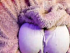 a beegxxx video woman in a fluffy suit shows her body