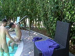 Two horny boys have hot blowjob by the pool