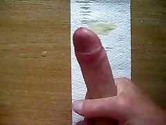 Another jerk off and cumshot over more porn