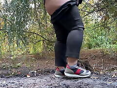 MILF dressed in pants pissing in small tube jav av idol outdoors