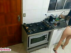 Maid in panties organizing the kitchen