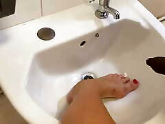 Nemo pisses all over my feet in a public long leg teen sink