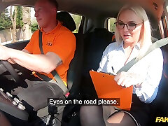 Louise Lee flashes her tits to pass her driving test. HD video