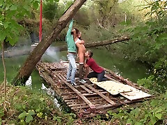 Hardcore outdoor MMF threesome with Anabelle pounded on a raft