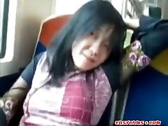 Asian milf rubs her masturbation hd on a train.