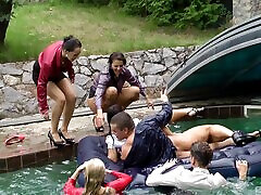 Clothed wet bitches having a hardcore suck face kiss in the pool