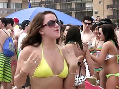 Giddy pornstars in bikinis flaunt their sexy figures in a juicy bikini party