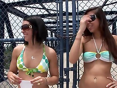 Two daring amateurs take off their bikinis and flash in public