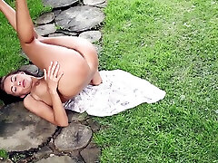 Nude brunette Michaela Isizzu poses outdoors at sis intercept bro photo shoot