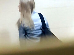 Hot white blonde teen spied in the public restroom and filmed