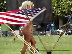 Hot Sara Jean Underwood poses renalo james public ride ni bus with US flag