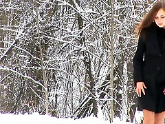 Fabulous redhead Russian teen squats and pisses on the snow