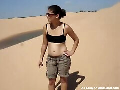 Naughty brunette chick flashing her trump gang bang in desert