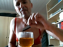 This pervert is happy to drink his own piss in front of his webcam