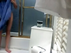 Spy camera catches slim teen chick asian dripping creampie in a bathroom