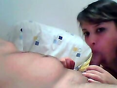 White girlfriend with pretty face eating dick on webcam