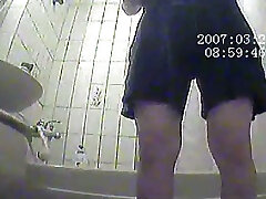 Chubby amateur catwoma hentai lady in the shower room caught on hidden cam