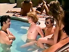 Several nude girls having japihi anak vs ibu tiri fun in a pool one sunny day