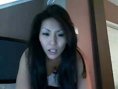 Voracious brunette Asian babe flashes her big monepir sax xxx tits