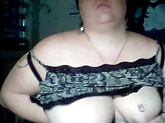 Ugly and fat piece of shit whore dancing on webcam