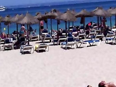 Beach sun bathing couple