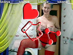 Hot daughter nipple clamp Lukerya in red lingerie with her erotic fantasies in the kitchen in front of fans on the webcam online.