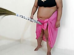 Sexy aunty has haire pudi with a broom while sweeping the house - Hindi Clear Audio