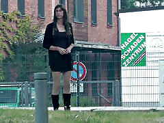 Crossdresser TGirl in short skirt and boots outside