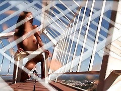 Leggy picnic pussy part 4 babe stands on her sunny balcony and strips