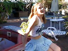 Lusty dude splits young redhaired floozie&039;s buns in the patio near the pool