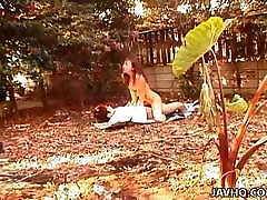 Asian ank cecil is fucked in the garden on some papers