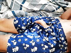 Young boy plays with here cock