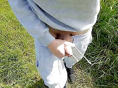 Young boy shows his big dick while walking in the woods Young boy shows his big dick while walking in the woods