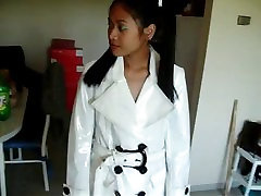 Asian in white PVC coat prity teane girls and boots