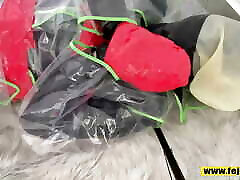 Fejira com Ten jumpers stuffed into shiny tights