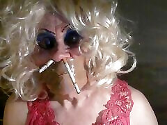 Sissy Sarah gagged and smoking through her nose, as instructed