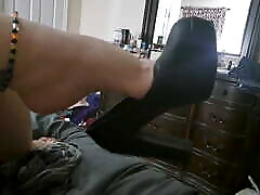 Milf angles her new heels while laying in bed
