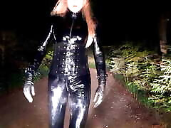 Rubberdoll posing in park at night