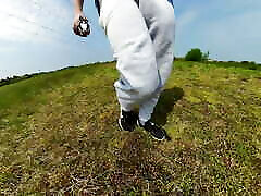 Freeballing walk in nature with a massive sweatpants bulge