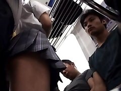 Amateur Asian in short skirt is touched by PublicSexJapan.com
