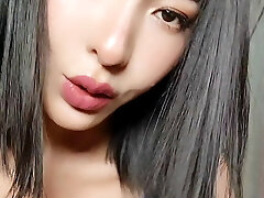 Famous Asian actress Elise in blue stockings underwear. DD natural milky asian tits.