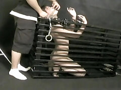 Asian brunette gets teased and stimulated during restrain bondage