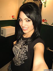 Black hair babe Alyra showing her dark side, piercings and small natural tits